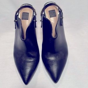 White House black market, Jade black heels 
Gold tone chain on shoe front strap